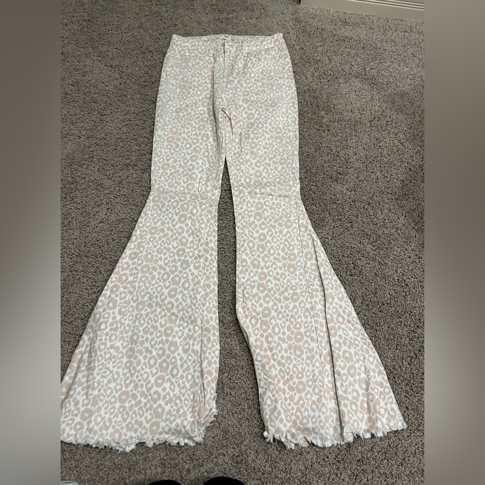 Altard State pink and white cheetah print flare jeans size Medium
